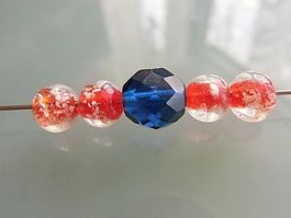 Glasperlen rot, 6mm, glow in the dark 5 Stück