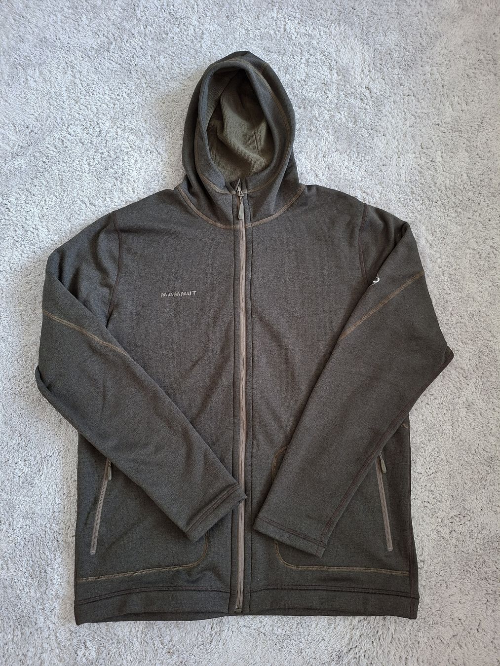 Mammut Giacche: Veste Mammut capuche gris vert fonce  – Usato da Renens VD venduto da ser_j2fn