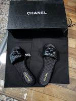Mules Chanel cuir d'agneau noir taille 37