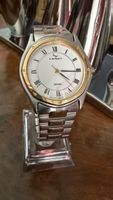 Montre SEIKO homme quartz parfait état 