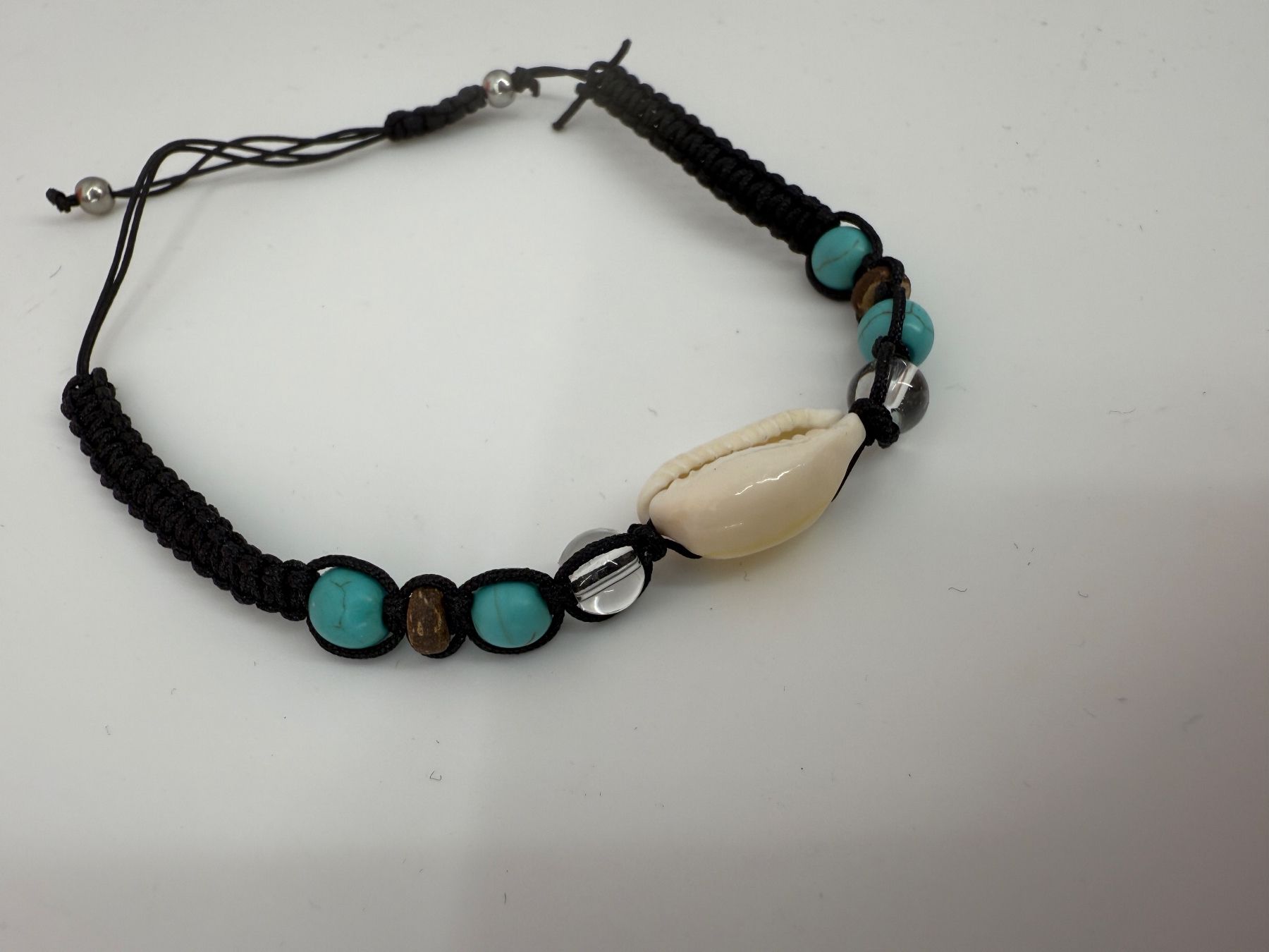 Bracciali & Braccialetti: Armband mit Muschel – Usato da Auenstein venduto da moin. 1