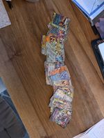 71 ex, 4 V Pokemon cards. Small portion L played, most excel
