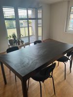 Extendable dining table and chairs