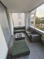 Rattan-Sitzecke mit Tabouret 
