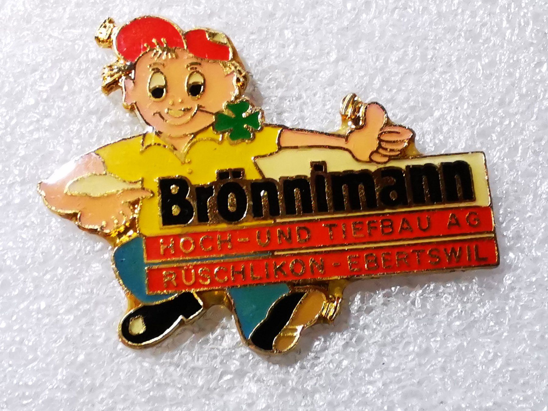 Plaketten & Abzeichen: Ansteckpin 49: Brönnimann Tiefbau – Gebraucht aus Oppligen von Pin-Fall-Shop