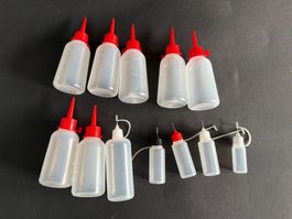 12 Tropfflaschen, wie abgebildet. Ca. 30 - 100 ml. NEU!