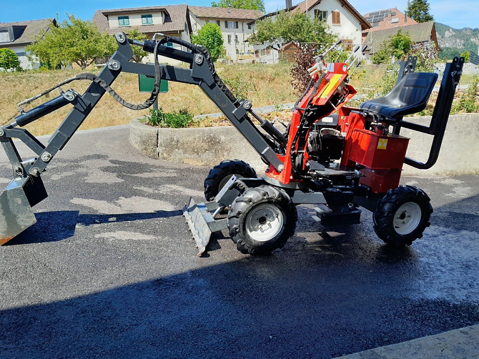 Bagger: Minibagger/Pneubagger Allrad – Gebraucht aus Mümliswil von rem_y66k