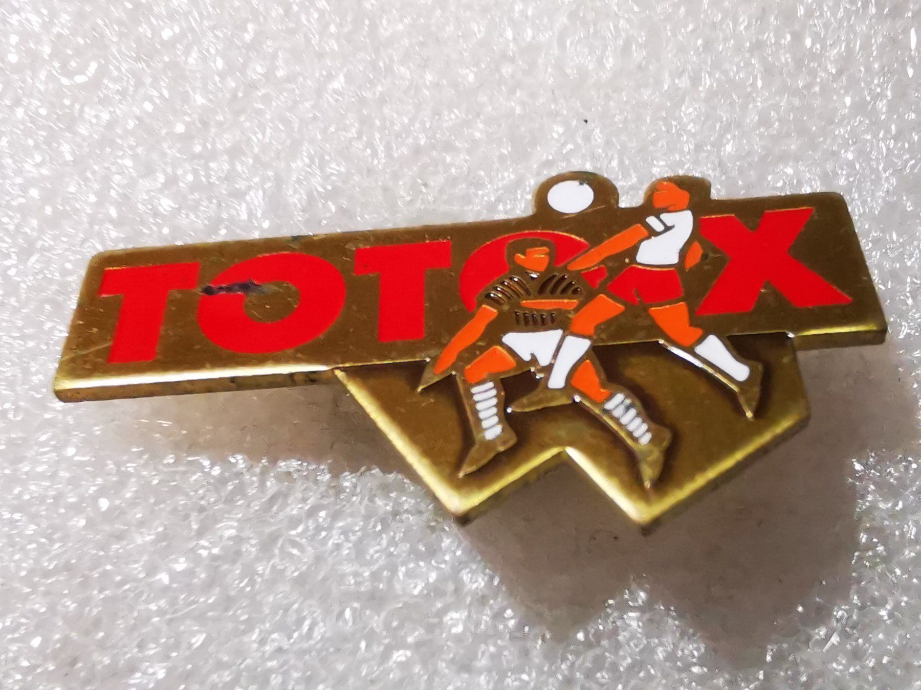 Placchette & Badge: Ansteckpin 15: Toto X – Usato da Oppligen venduto da Pin-Fall-Shop