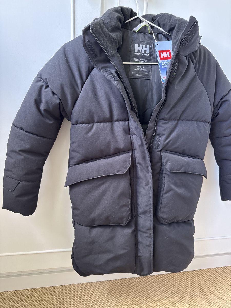 Helly Hansen Cappotti: Doudoune Helly Hansen noire, taille 128, comme neuve! – Usato da Puidoux venduto da serendipite