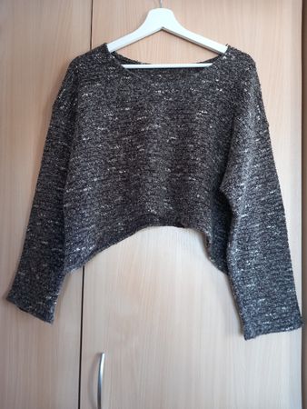 Pull court gris chiné en tricot