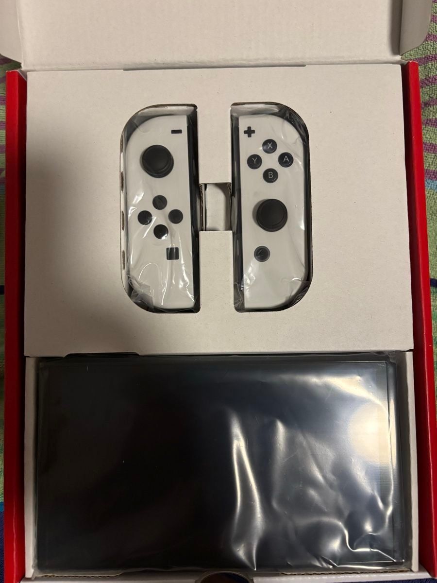 Nintendo Consoles: Switch OLED – D'occasion à St. Gallen par sudovimfstab 1