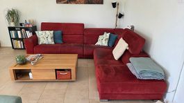 Canapé d'angle 5/6 places rouge foncé en bon état général