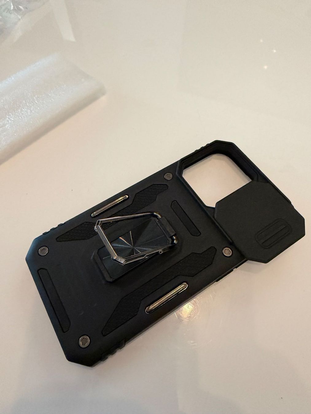 Apple Cover & Protezioni schermo: iPhon 14 Pro Cover schwarz Kunststoff m. Linsen Klappe – Nuovo e nell'imballaggio originale da Kölliken venduto da Teguwegu 2