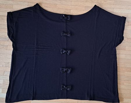 Débardeur noir avec nœuds papillon en sequin