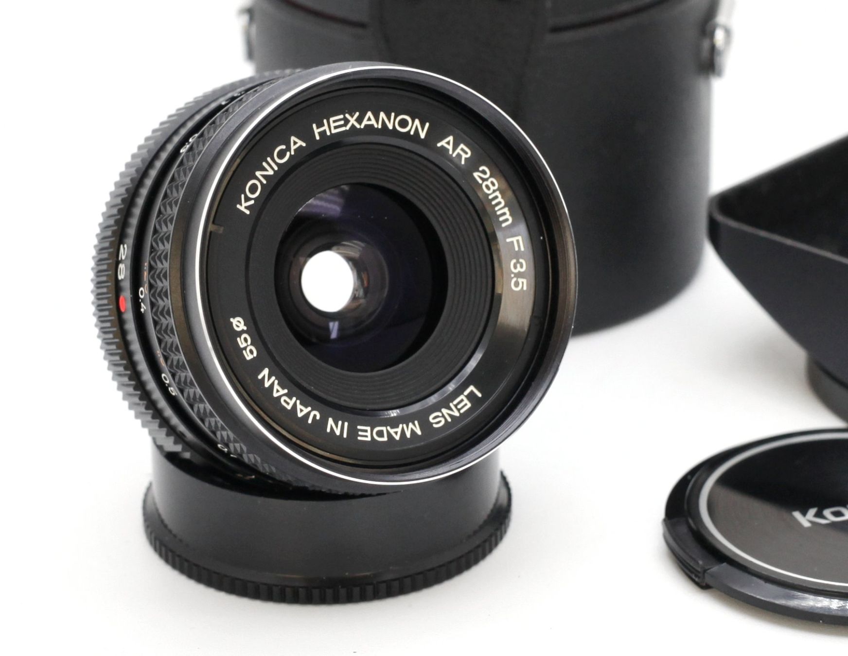Konica Obiettivi: Konica Hexanon AR 28mm f3.5 komplett Set – Usato da Birsfelden venduto da Waldbrettspiel 1