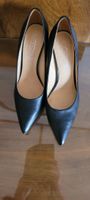 Schwarze Lederpumps