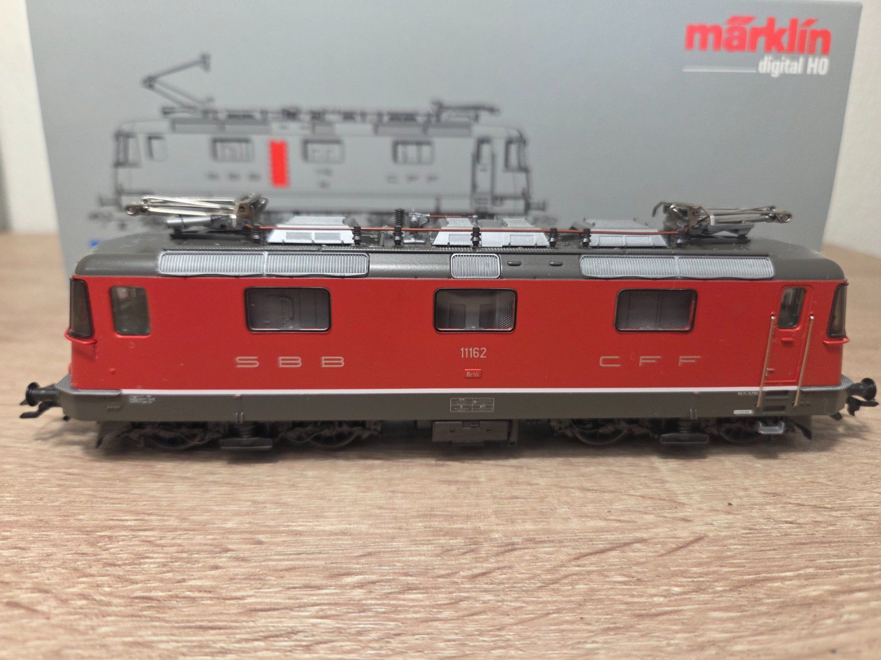 Märklin Modelleisenbahnen: Märklin 3734 E-Lok Re 4/4" SBB Digital H0 – Neu und originalverpackt aus St-Aubin-Sauges von Lo_Go 1