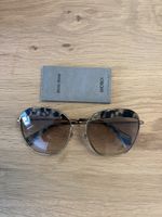 Authentic Miu Miu Sunglasses - Stylish Summer Shades!