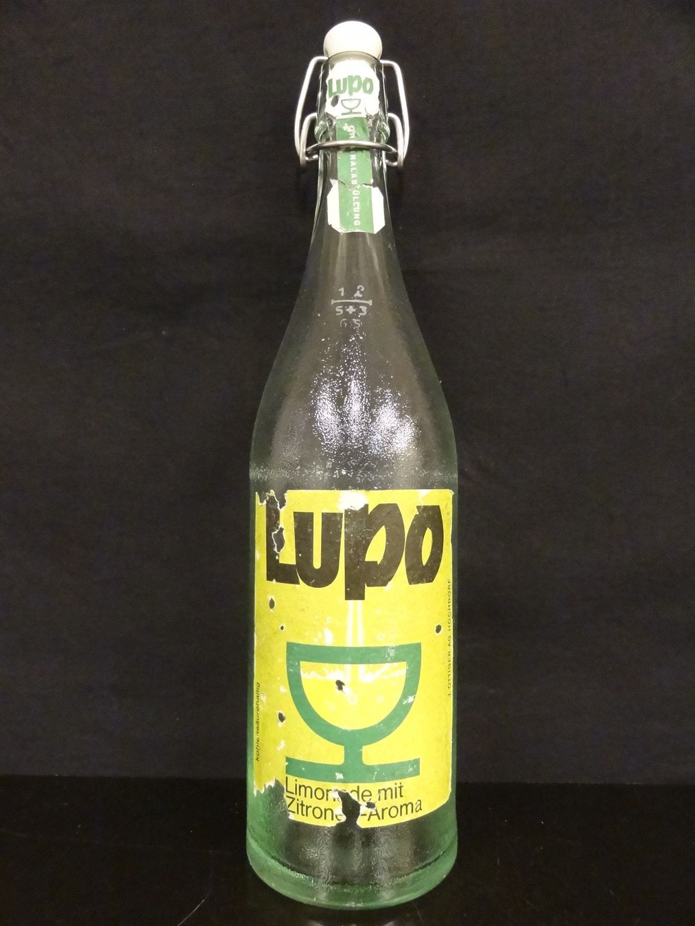 Bicchieri, Caraffe & Bottiglie: alte Flasche LUPO LIMONADE 1965 – Usato da Kerzers venduto da Flaschenposten