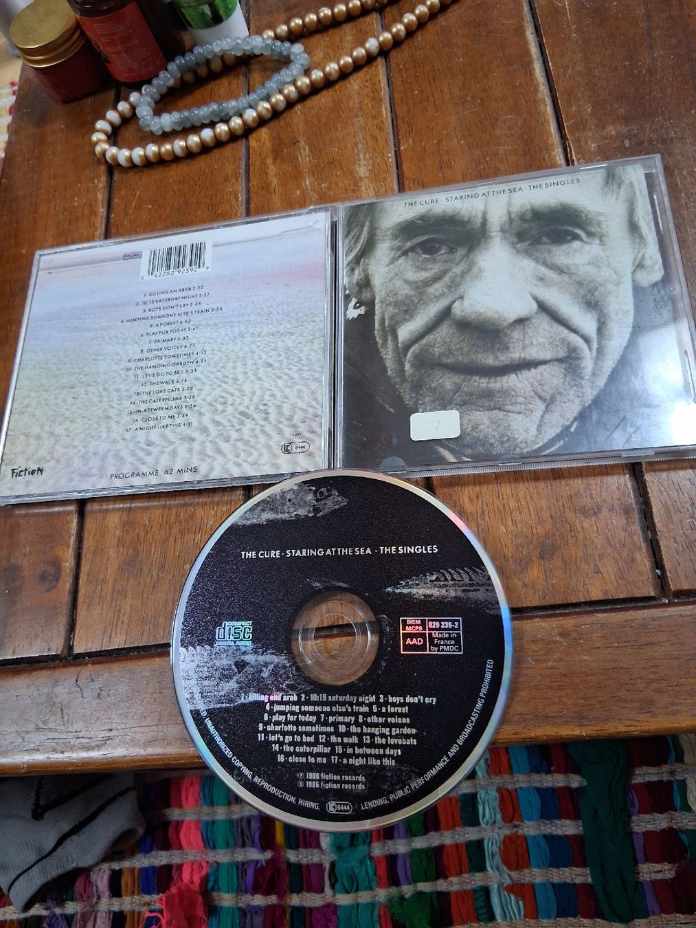 CD: the cure- staring...the singles – Usato da St-Cergue venduto da VeganWarrior