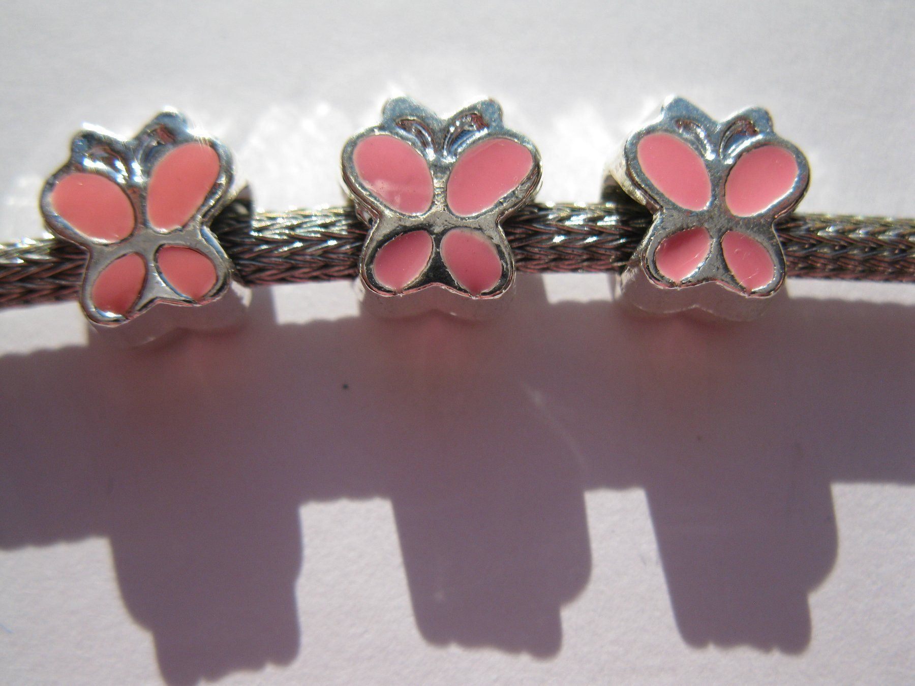 Perle (finte): 2 Grosslochperlen, Beads versilbert Schmetterling, rosa – Nuovo e nell'imballaggio originale da St. Margarethen TG venduto da LuanaKa 1