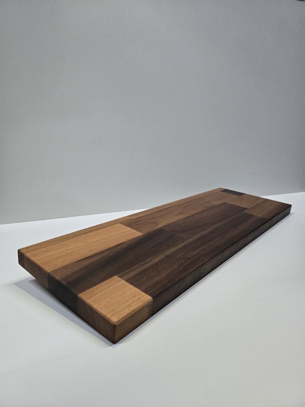 Articoli in legno: Schneidebrett Nussbaum Handgemacht  – Nuovo e nell'imballaggio originale da Ringgenberg BE venduto da sto_ply2