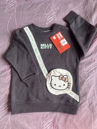 Sweater Hello Kitty, neuf, 3 ans, avec poche en forme de sac