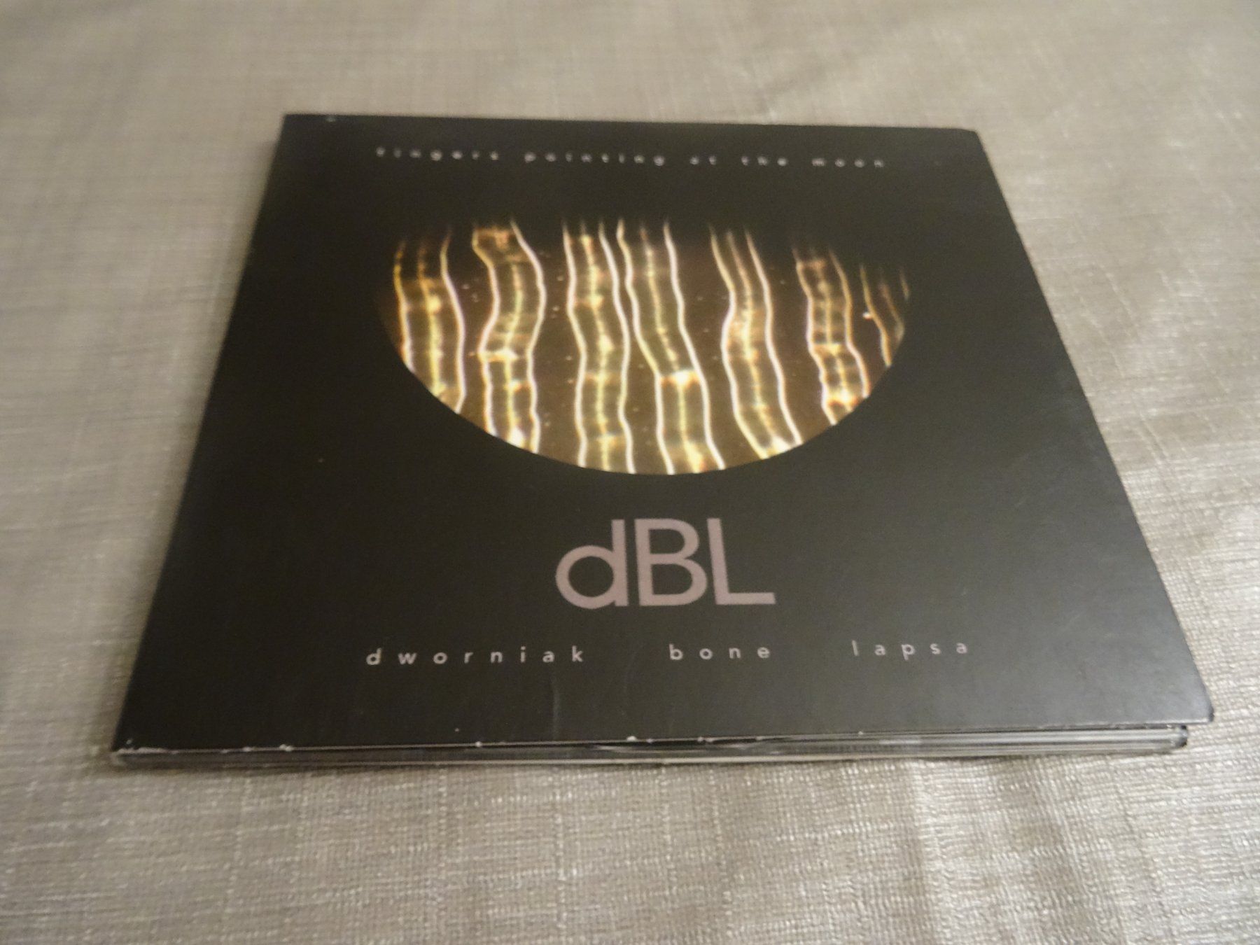CD: DBL Fingers Pointing at the Moon CD – Usato da Olten venduto da Disc-Ausverkauf