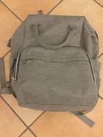 Grauer praktischer Wickelrucksack 