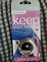 Design Go Taschenhalter Tischhalter