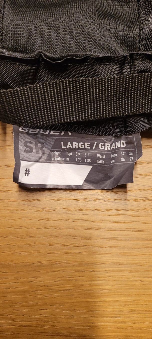 Bauer Pantaloni: Bauer PANT COVER SHELL Senior. Überhosen – Nuovo (secondo la descrizione) da Ellikon an der Thur venduto da Fabian-72 2