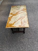 1 table basse de salon dessus en marbre haut. totale 50cm.