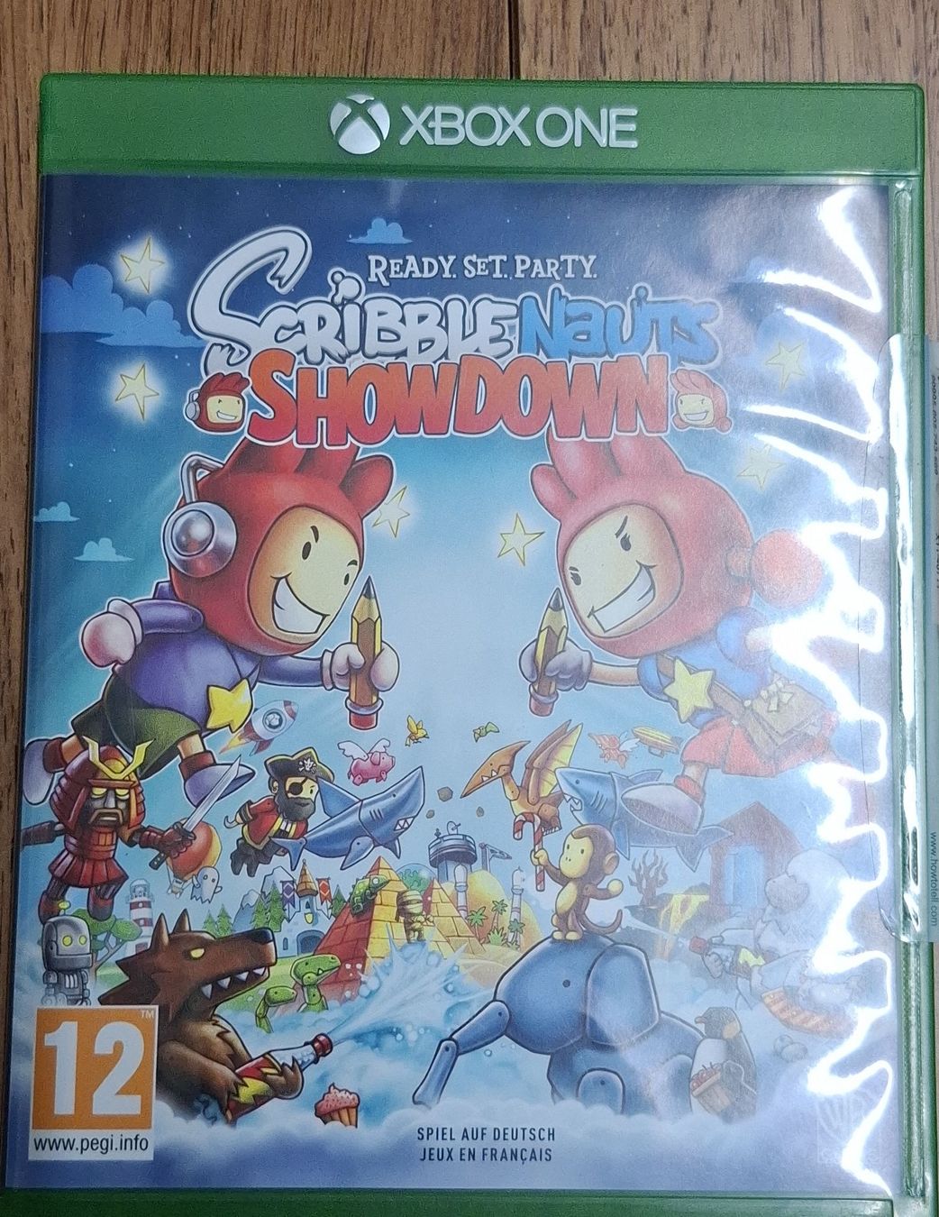 Family Spiele: Xbox One Spiel - Scribblenauts Showdown - Top Zustand! – Gebraucht aus Lyss von Nigudasschaf
