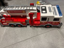 Camion de pompier Playmobil avec quelques accessoires
