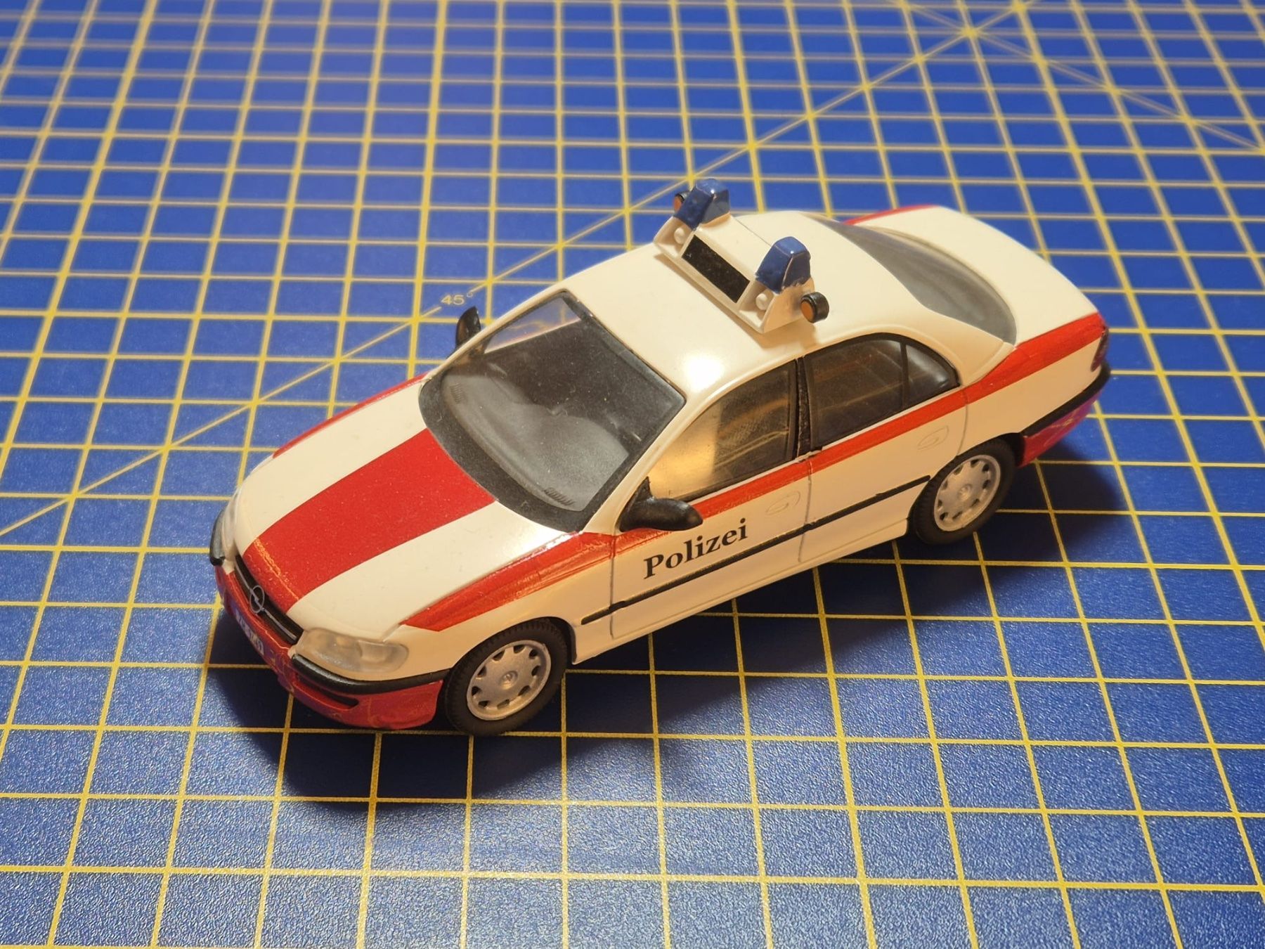 Opel Modellini d'auto: Opel Omega B Gemeindepolizei Rüti 1:43 – Usato da Lachen SZ venduto da myr_qk5y