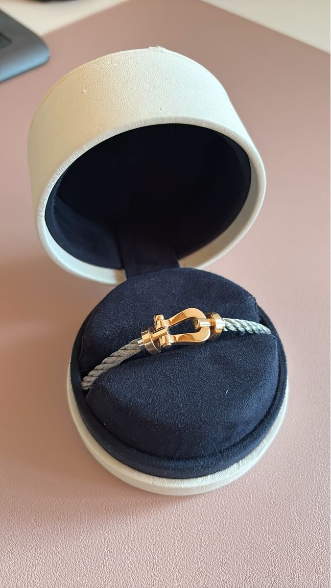 Bracciali & Braccialetti: Bracelet Fred Force 10 Câble Gris Acier Or Jaune – Usato da Monthey venduto da LoveBrand