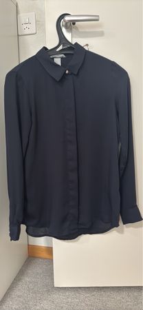 Elegante, navyblaue Bluse