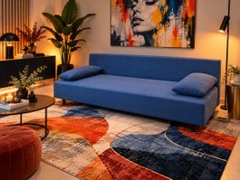 Schlafsofa blau mit Bettkasten in gutem Zustand