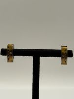 Boucles d’oreilles en or jaune et blanc serties de diamants