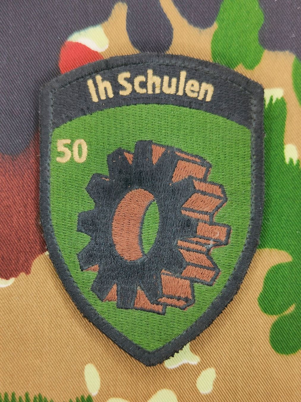 Schweizer Armee Uniformi: Verbandsabzeichen Ih Schulen 50 – Usato da Bauma venduto da SwissMilitaria