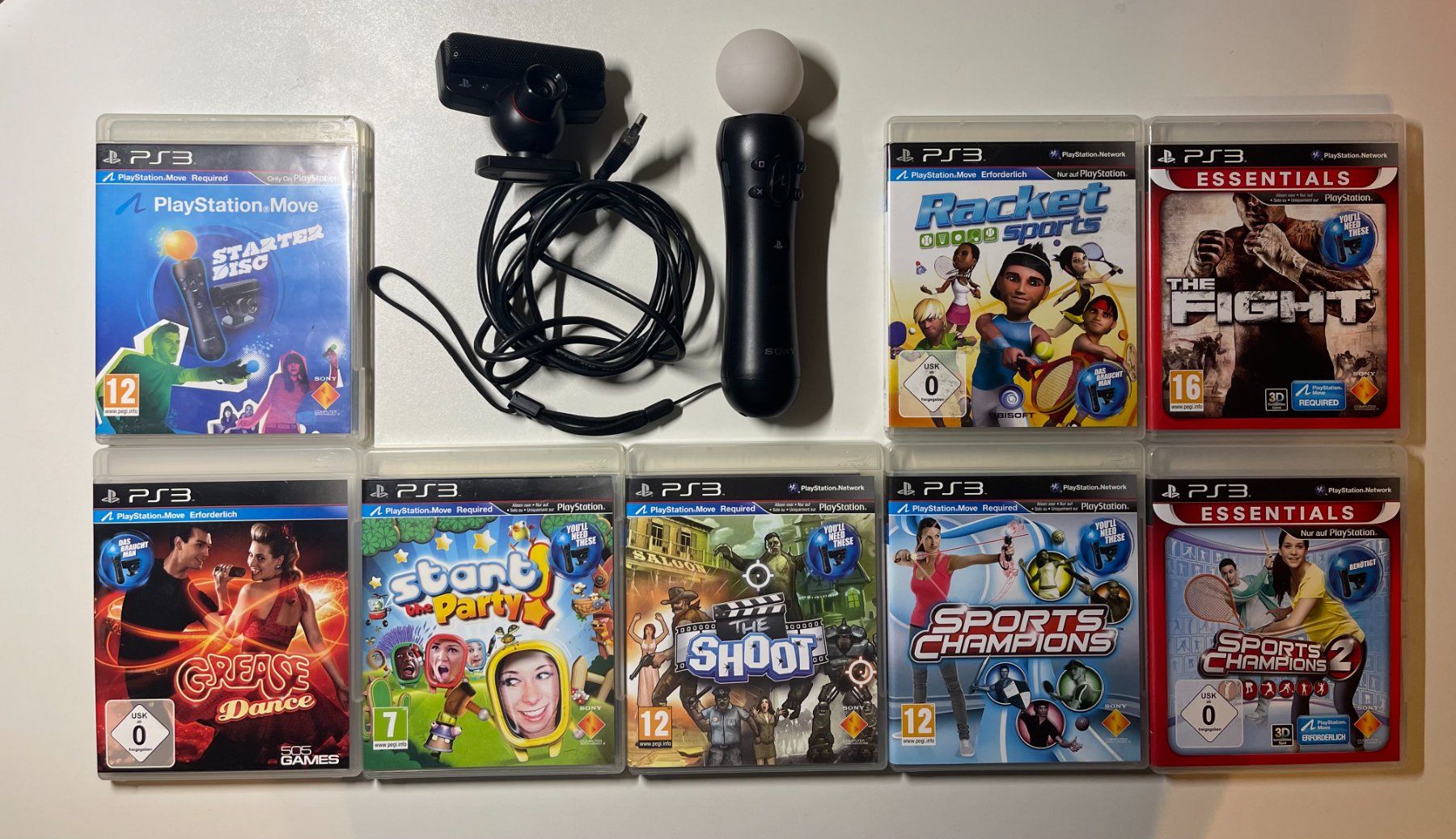 Sony Konsolen: PlayStation 3 Move Motion Controller, 7 games – Gebraucht aus Couvet von