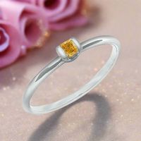 Solitaire-Ring mit 0.12 ct Fancy Vivid Yellow Diamant in 18K