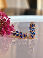 Boucles d’oreilles plaqué or et pierres bleues