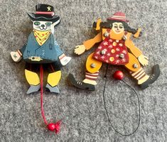 2 lustige Holz Hampelmänner bemalt