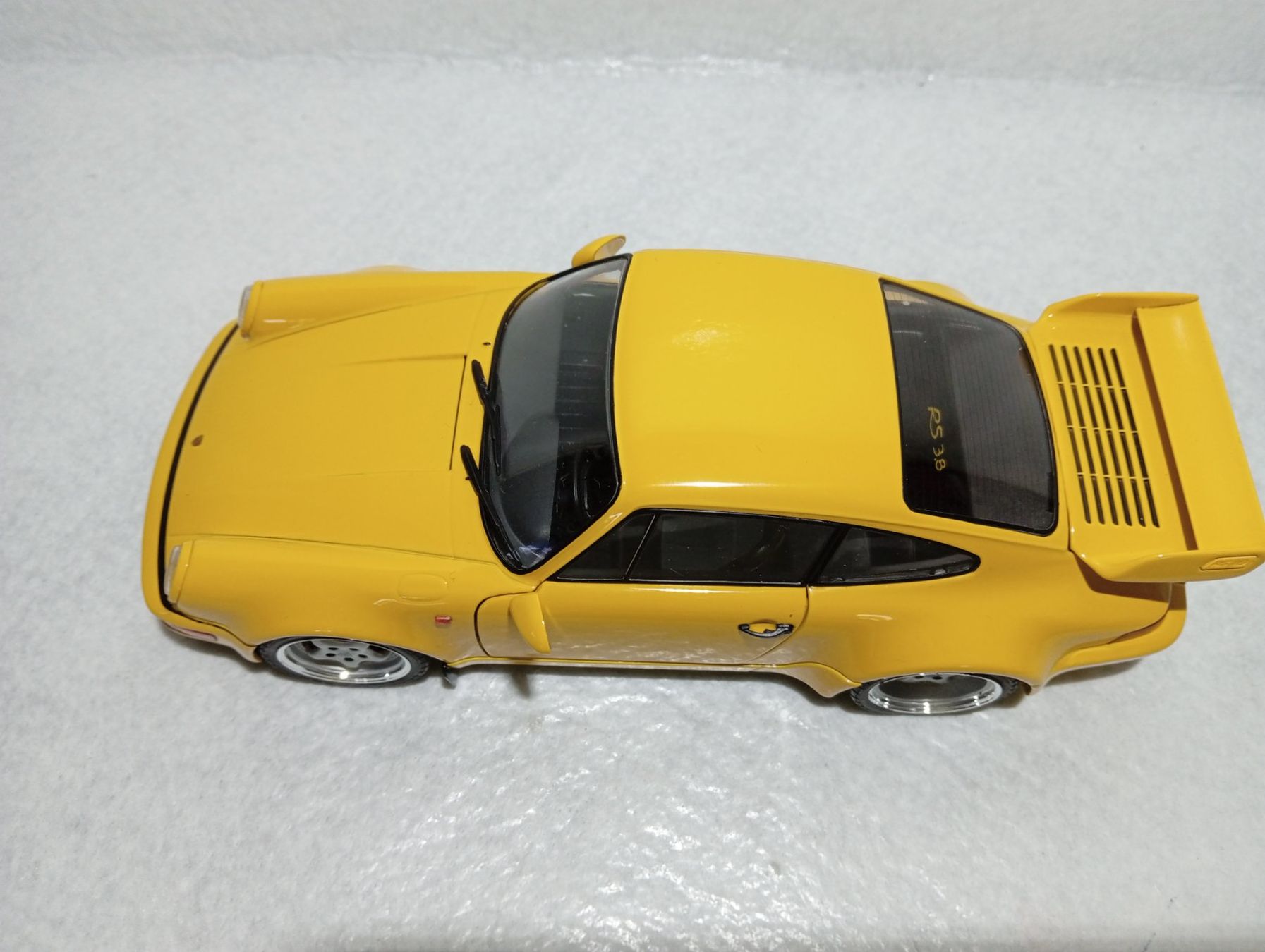 Porsche Modellini d'auto: Porsche Carrera 911 3.8 RS – Nuovo e nell'imballaggio originale da Huttwil venduto da Secondtrain 7