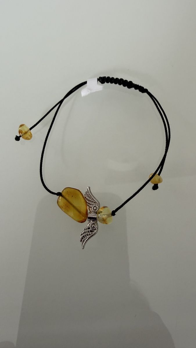 Bracciali & Braccialetti: Feines Armband mit einem Engel aus Bernstein – Nuovo e nell'imballaggio originale da Ebikon venduto da Leonidas2