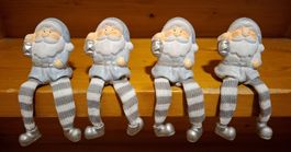 4 Weihnachtsfiguren sitzend blau weiss guter Zustand