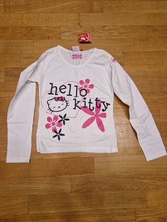 T-shirt Hello Kitty neuf, manches longues, taille 152 12 ans