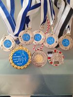 8 Medallien, v.a. Zumiker Lauf