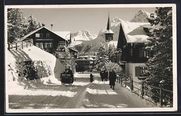 Arosa, Dorfstrasse mit Schlitten im Schn